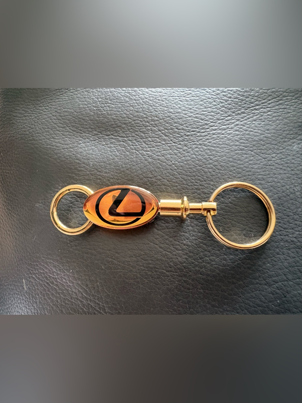 Vintage Lexus Gold-tone Keychain with Amber Oval Accent